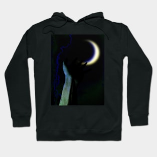 Digital collage and special processing. Hand pointing to the moon. Very beautiful. Blue and green. Hoodie